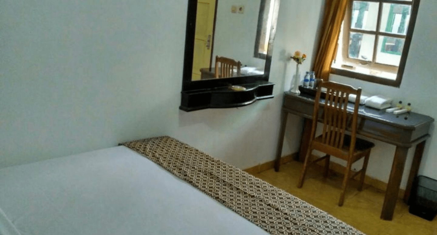 Kamar dengan Ranjang Single