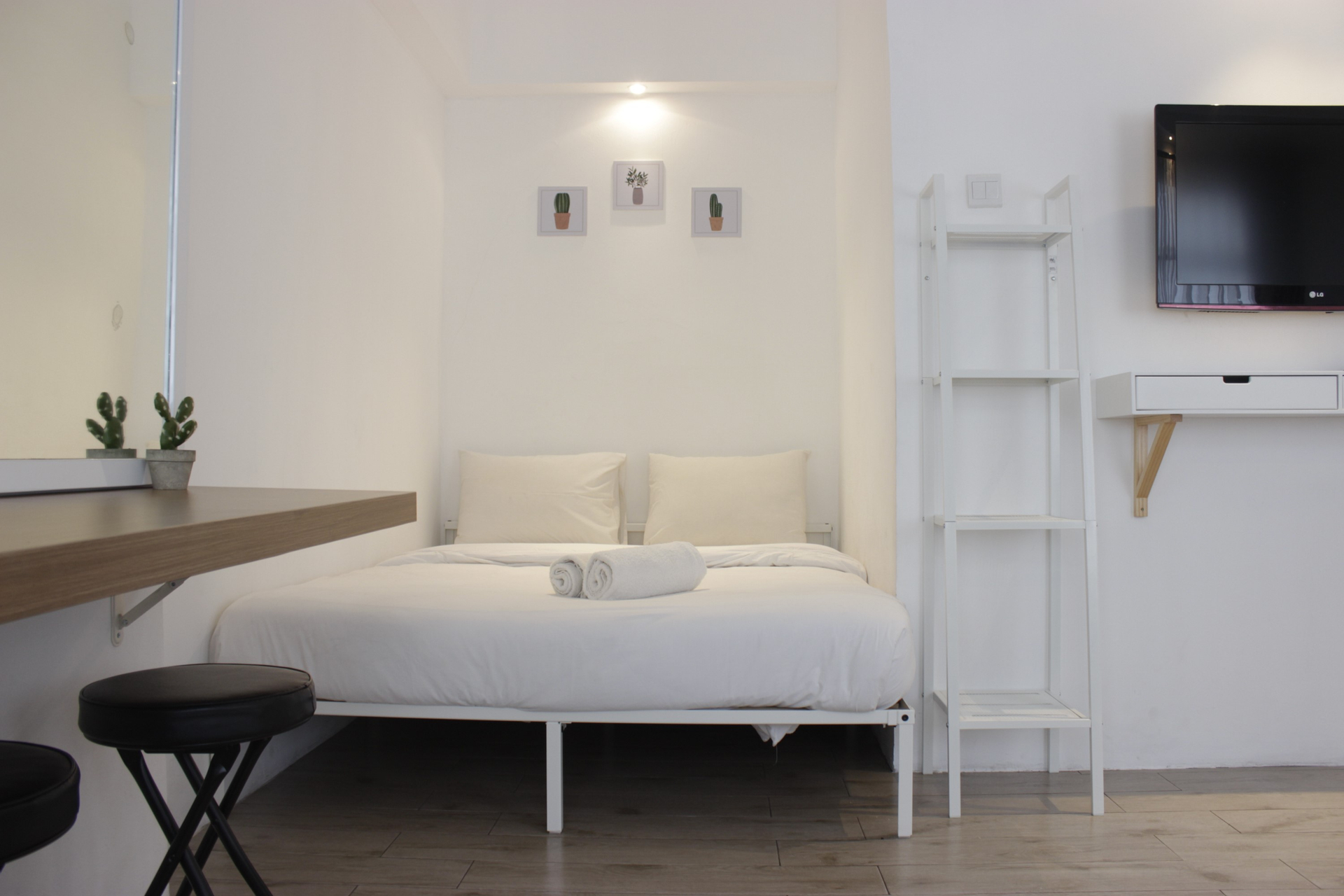 Bedroom 1, Modern Chic Studio Room at Grand Asia Afrika Apartment By Travelio, Bandung