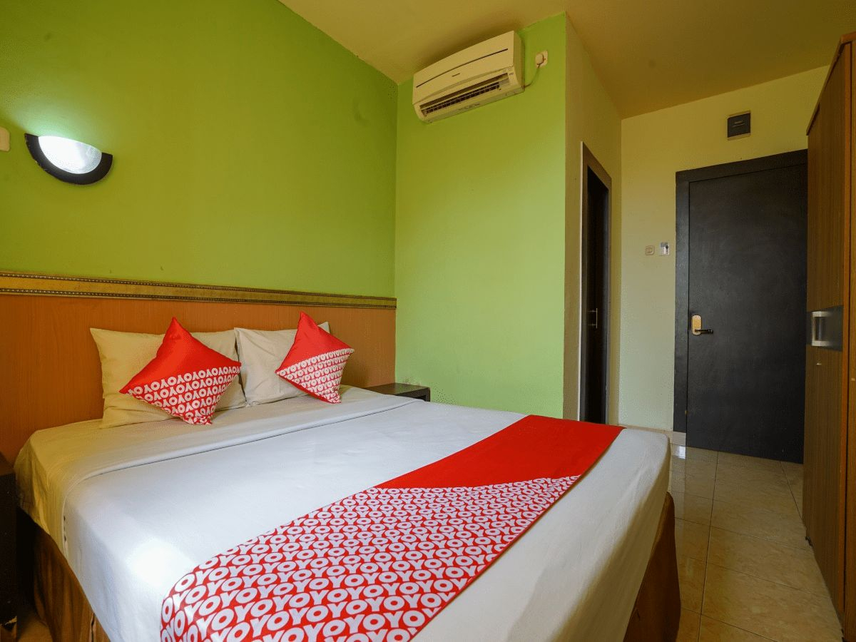 Bedroom 1, OYO 2255 Hotel Aifih (tutup sementara), Palembang