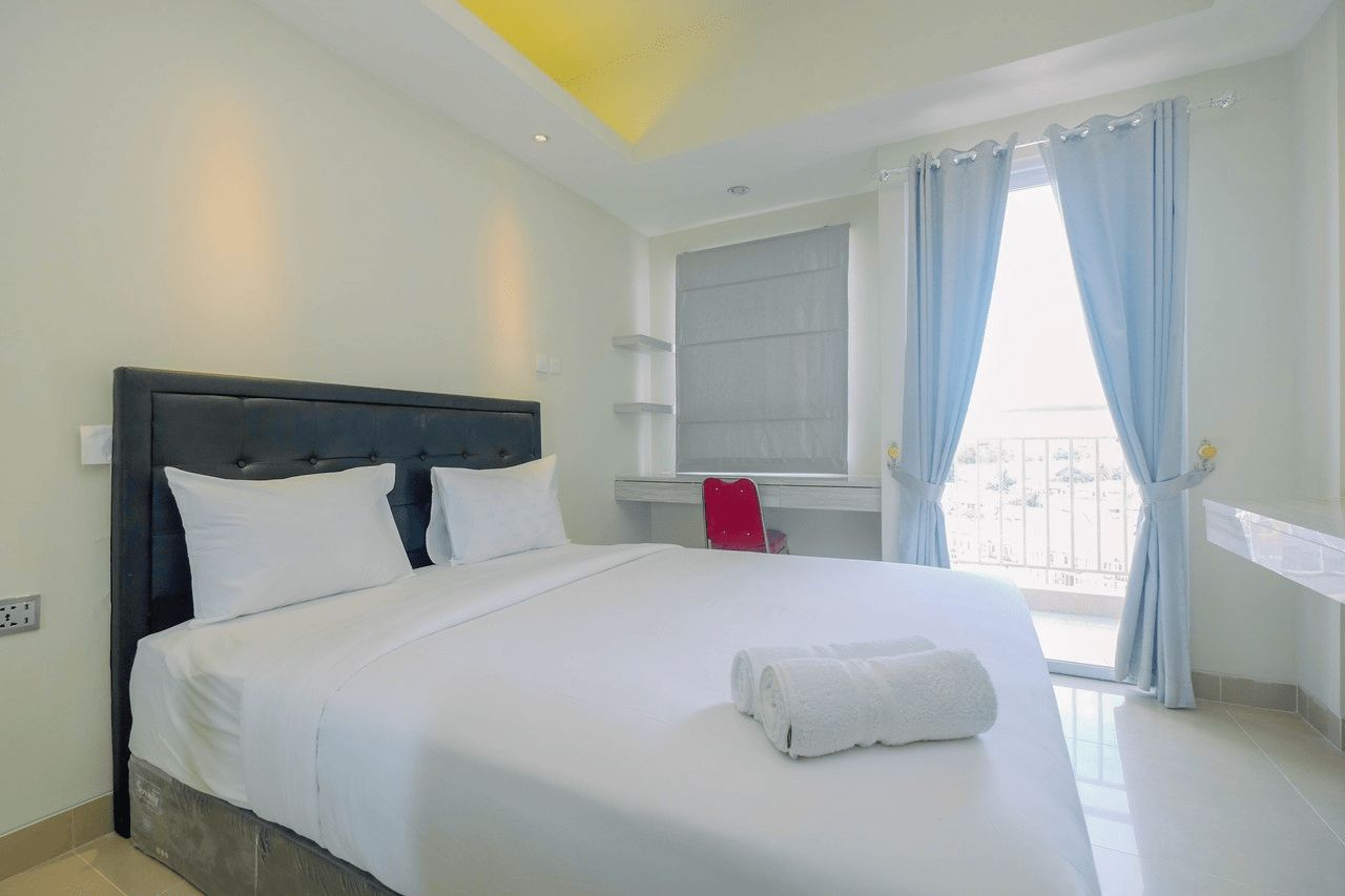 Bedroom 1, Cozy and Minimalist Studio Apartment @ Mustika Golf Residence By Travelio, Cikarang