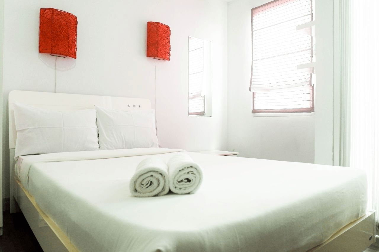 Bedroom 1, Comfy & Clean Studio Apartment at Puri Mas By Travelio, Surabaya