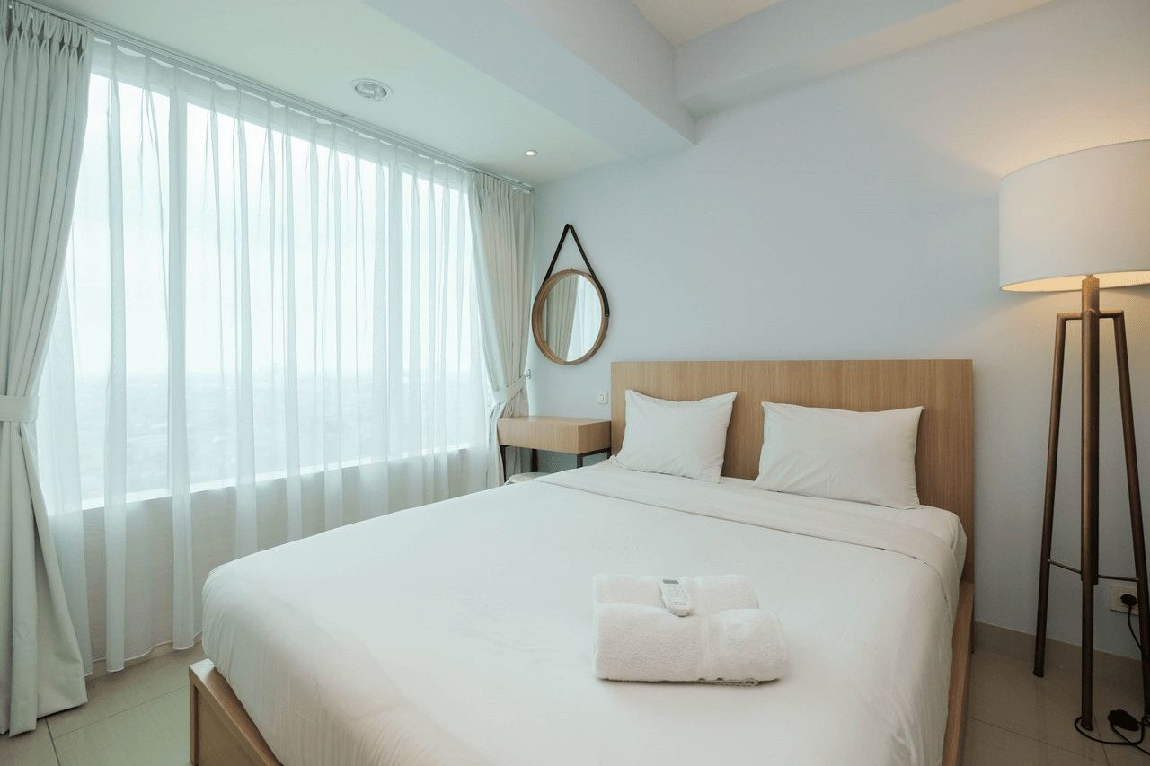 Modern and Spacious Studio Grand Kamala Lagoon Apartment By Travelio, Bekasi