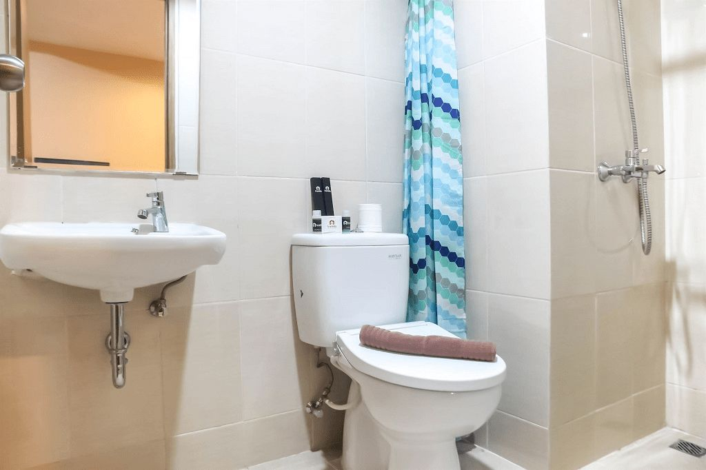 Bedroom 2, Spacious 1 BR at The Oasis Cikarang Apartment By Travelio, Cikarang