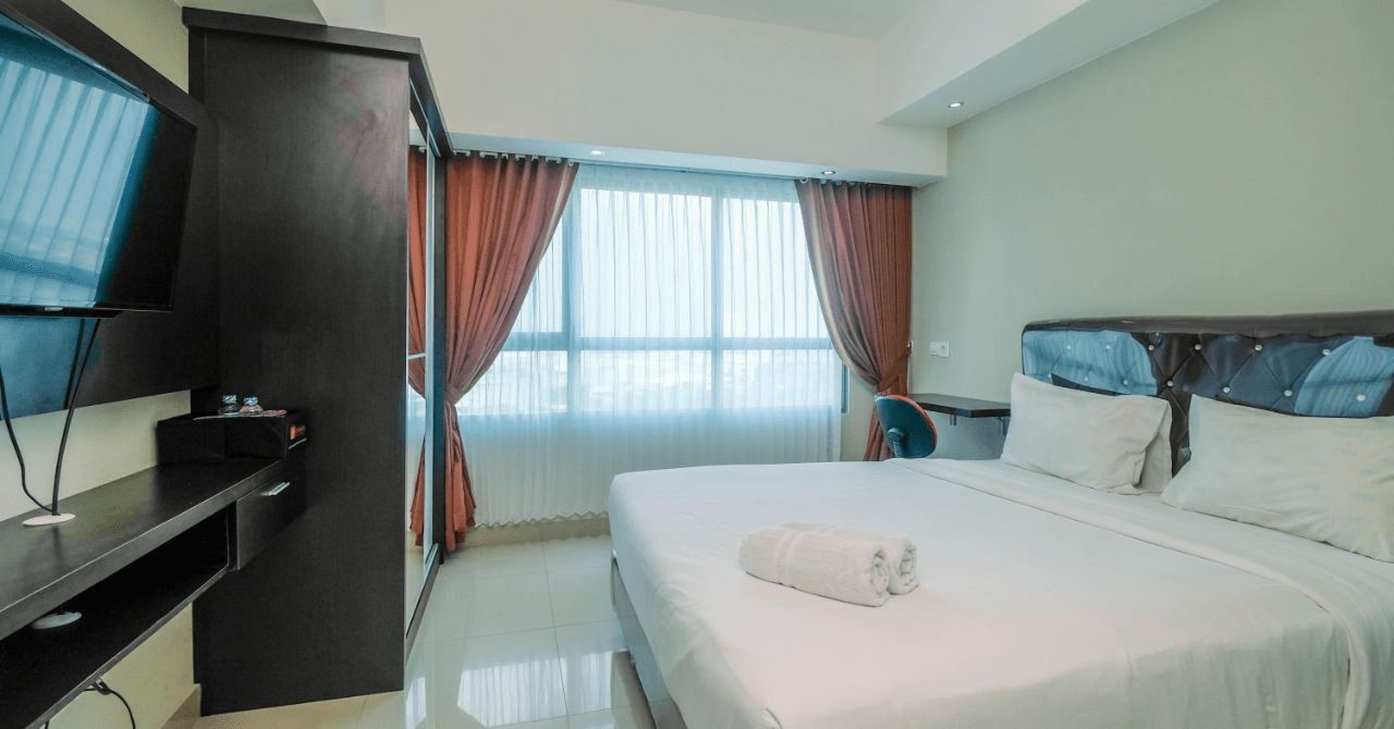 Bedroom 1, Pool View Studio Apartment @ Springlake Summarecon Bekasi By Travelio, Bekasi