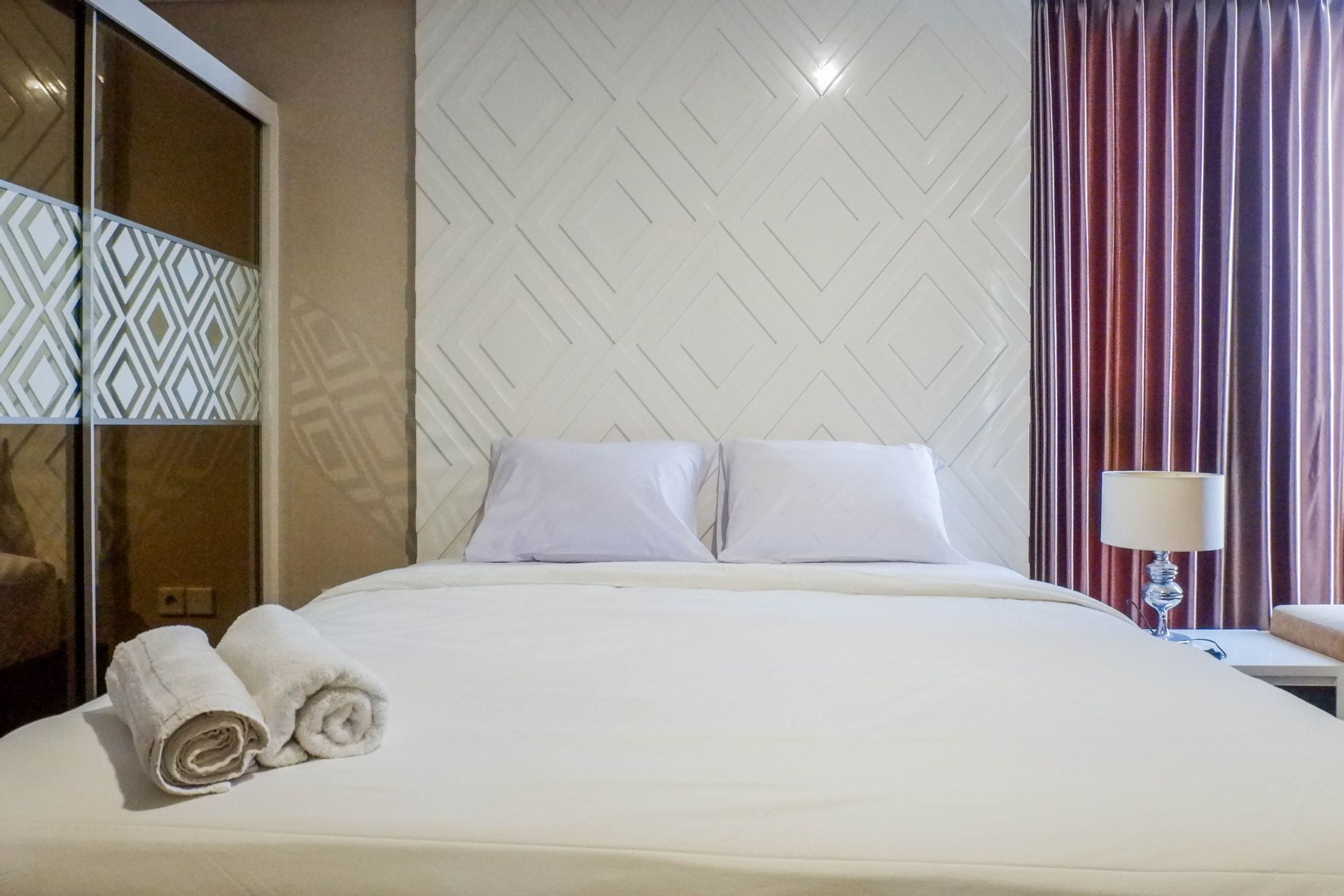 Bedroom 1, Strategic & Spacious 3BR Apartment at Trillium Residence By Travelio, Surabaya