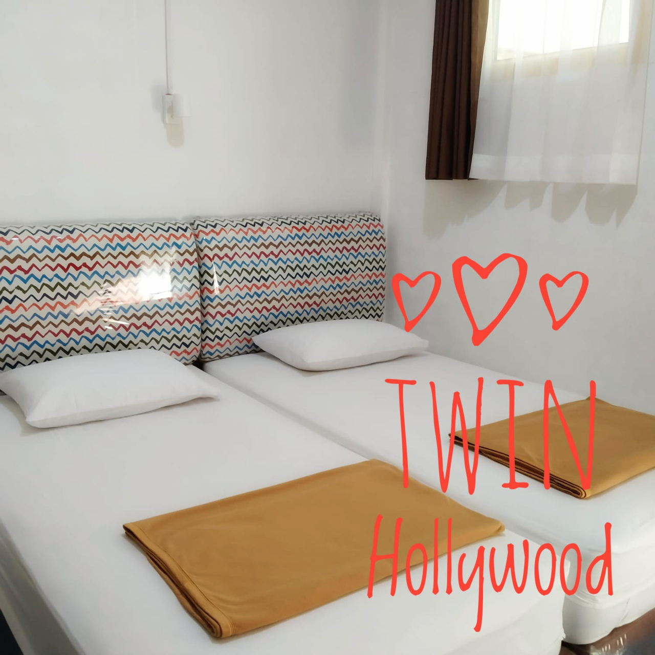 Kamar dengan Ranjang Twin