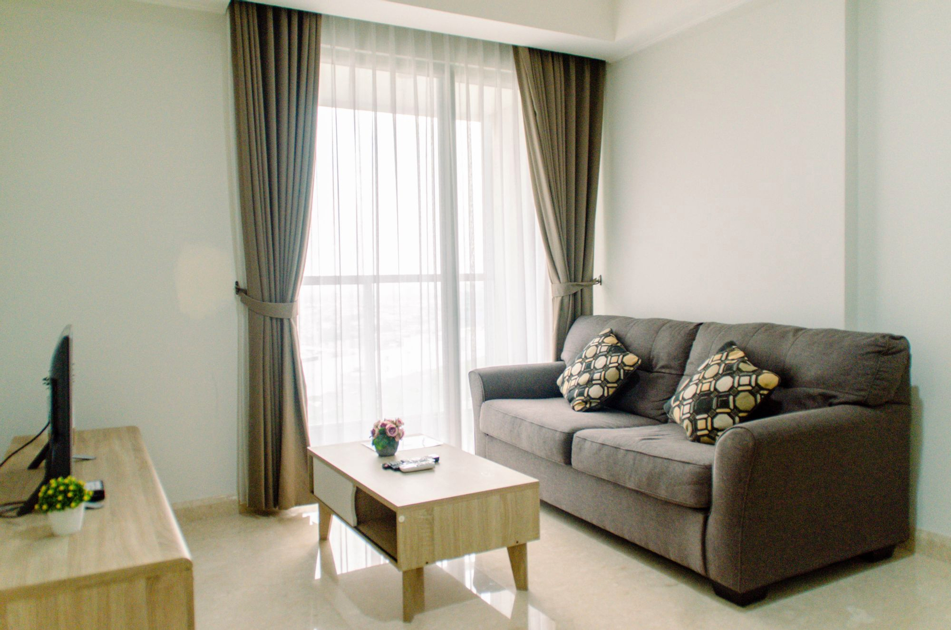 Bedroom 1, Comfort and Spacious 2BR at Gold Coast Apartment By Travelio, North Jakarta