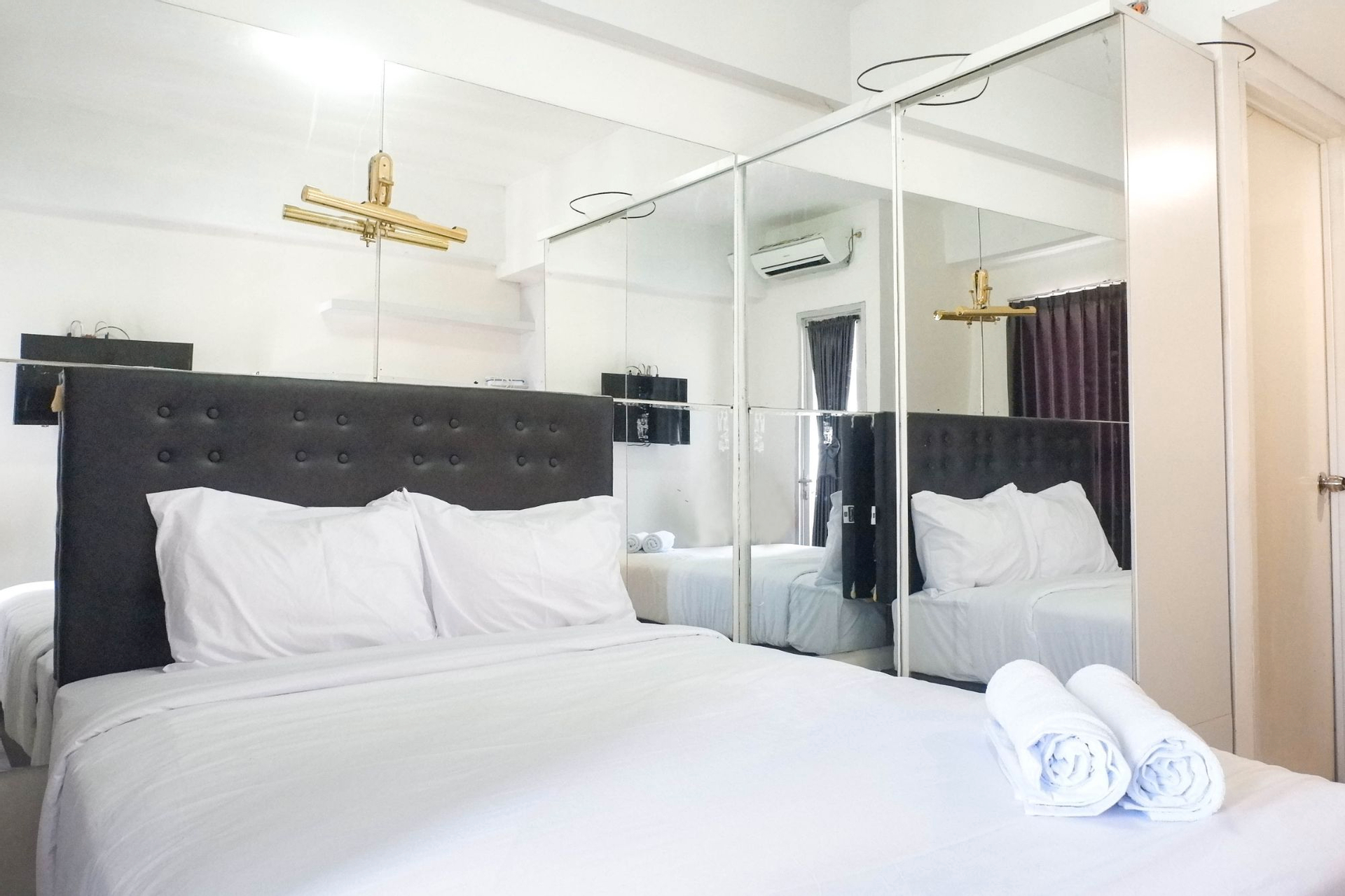 Bedroom 3, Cozy Living Studio Apartment at Puri Mas By Travelio, Surabaya