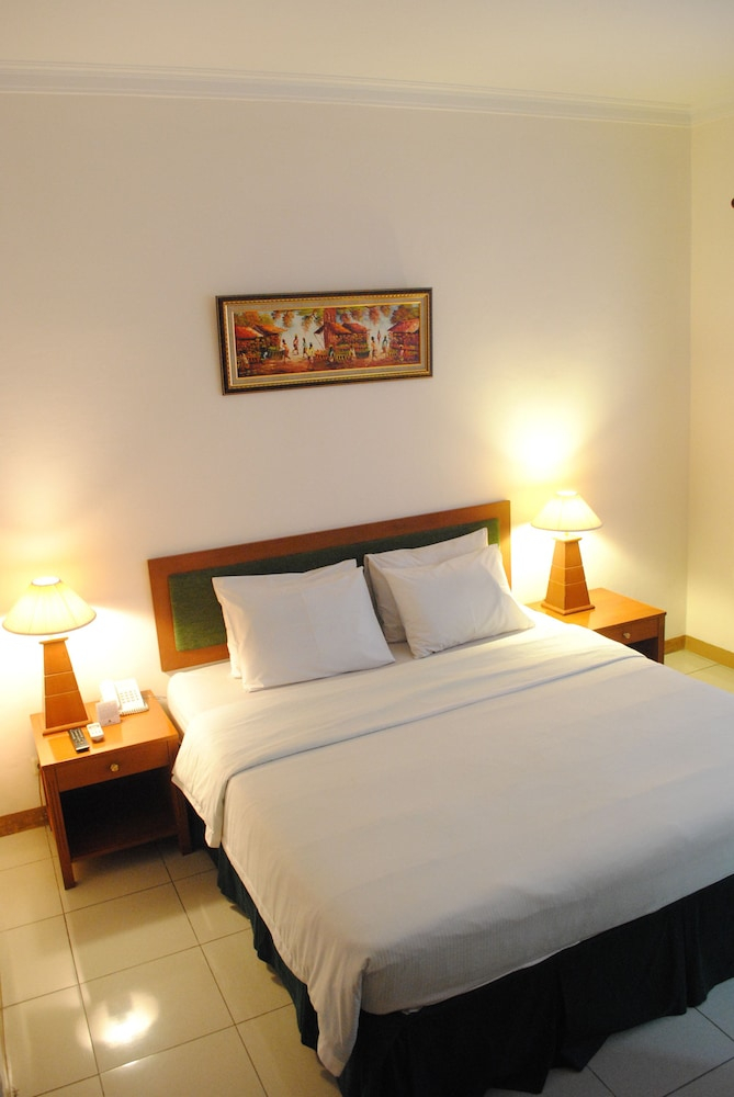 Bedroom 4, Griya Sentana Malioboro Hotel, Yogyakarta