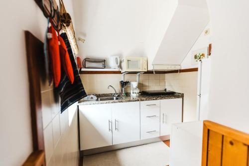 Kitchen 4, One bedroom house with enclosed garden and wifi at Porto da Cruz, Machico