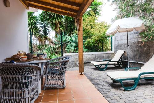 Balcony/terrace 1, One bedroom house with enclosed garden and wifi at Porto da Cruz, Machico