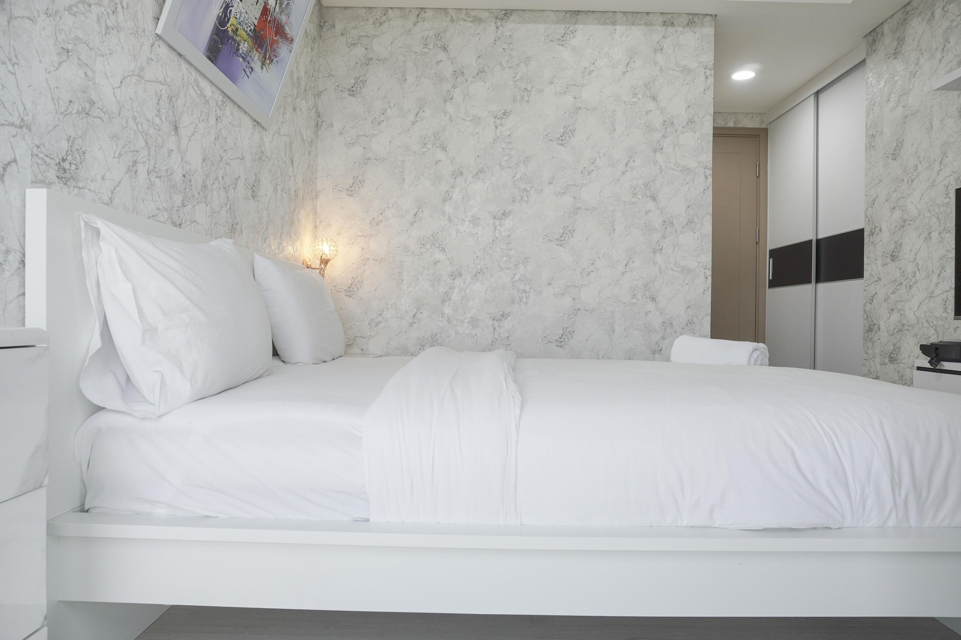 Bedroom 4, Warm and Elegant 1BR at Gold Coast Apartment By Travelio, North Jakarta