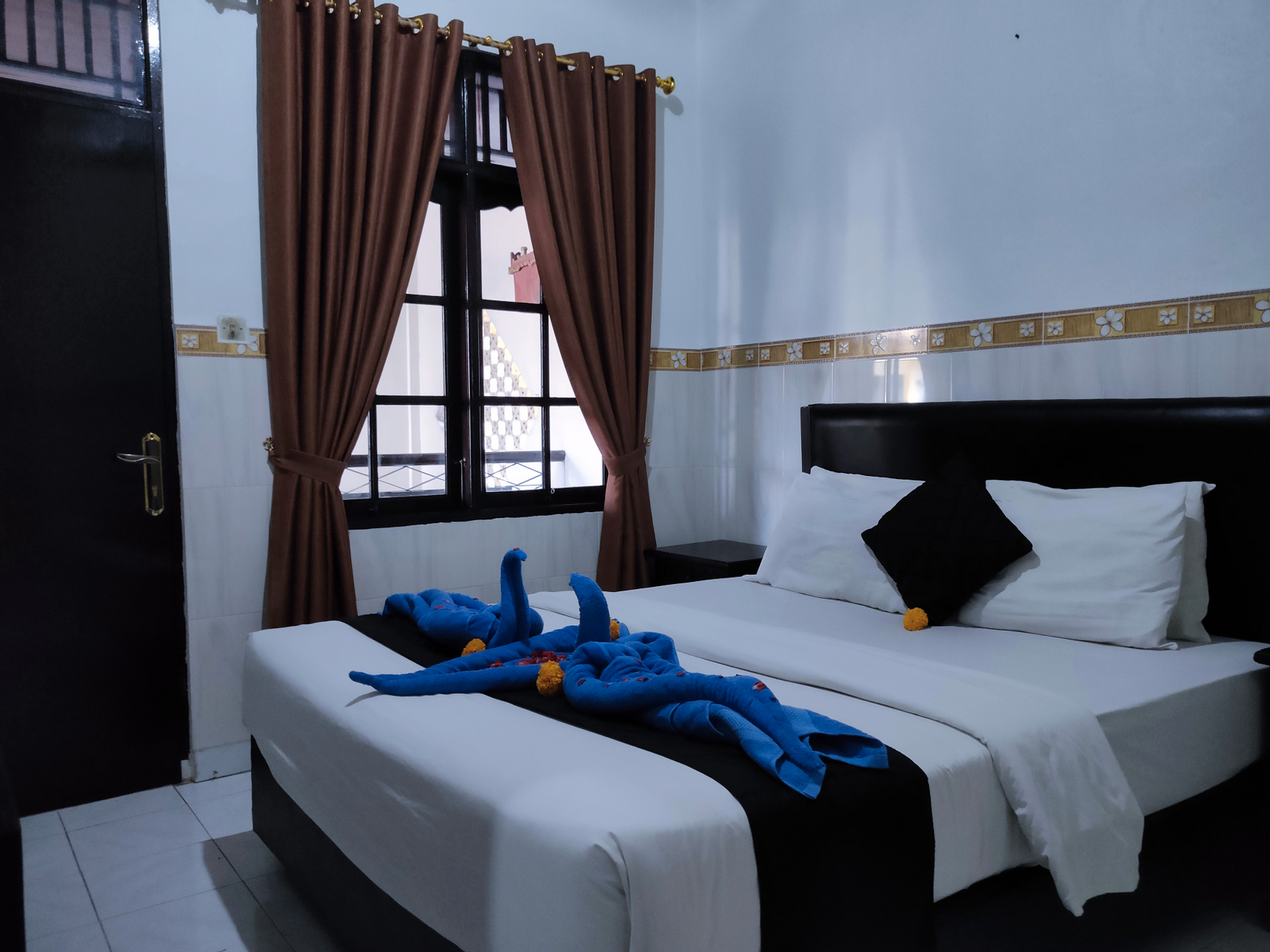Kamar Ekonomi Queen - Pemandangan Taman