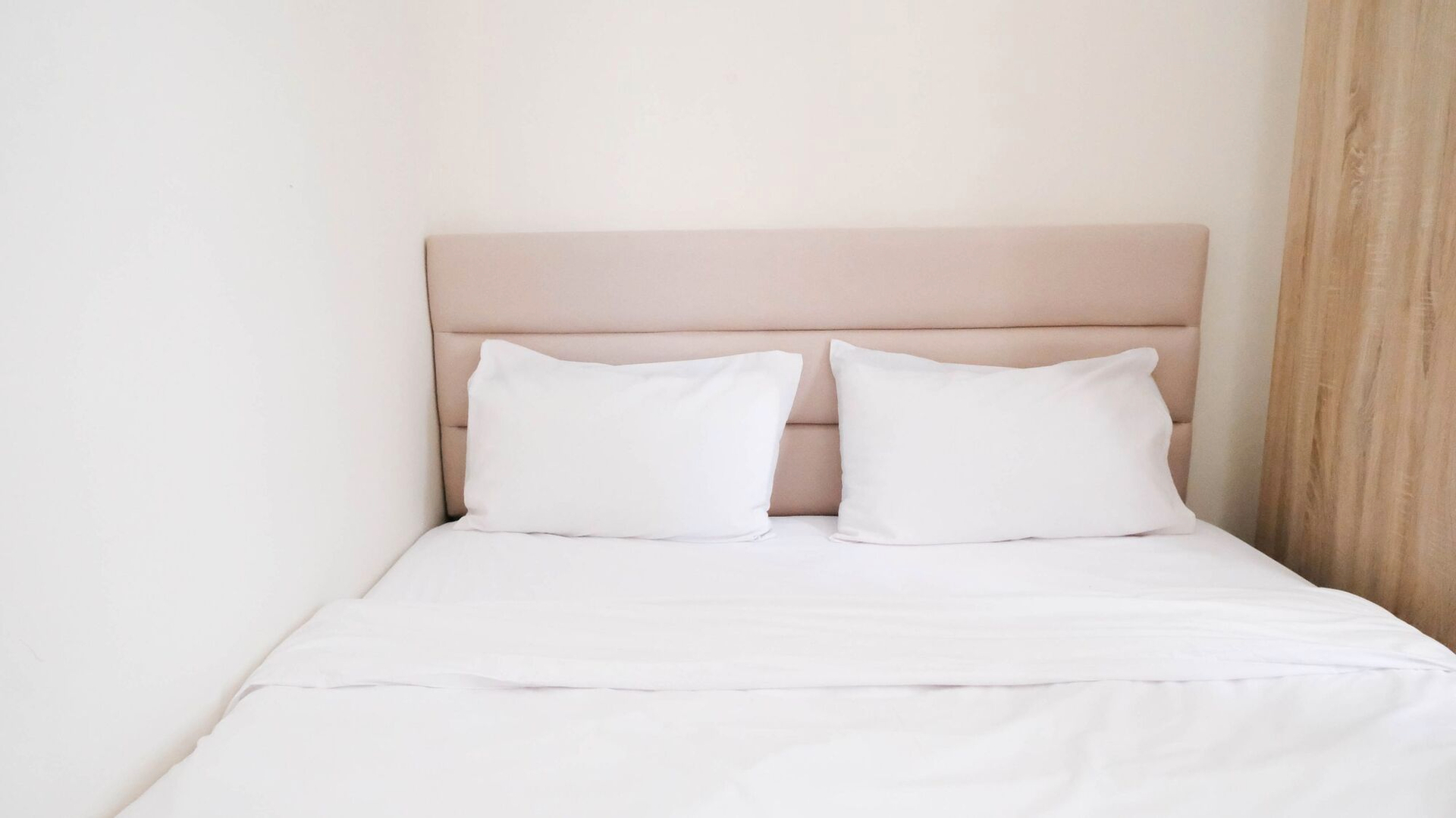 Bedroom 1, Clean and Comfy 2BR Apartment at Puncak Kertajaya By Travelio, Surabaya
