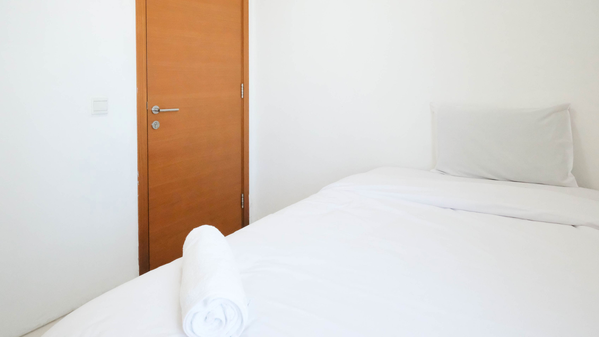 Bedroom 4, Spacious 2BR with Access to Mall at Aryaduta Residence Surabaya Apartment By Travelio, Surabaya