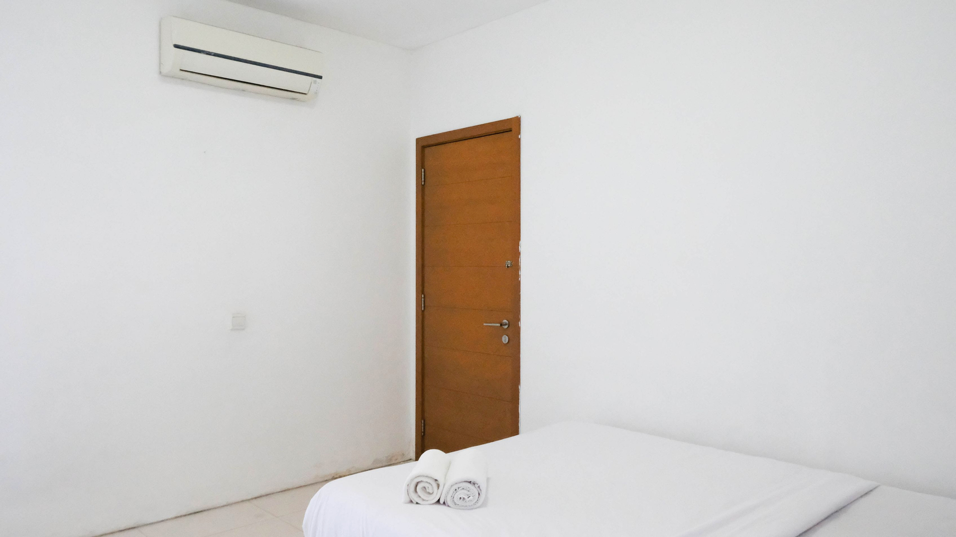 Bedroom 3, Spacious 2BR with Access to Mall at Aryaduta Residence Surabaya Apartment By Travelio, Surabaya
