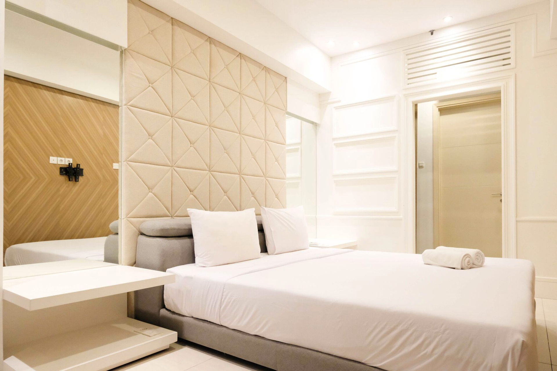 Bedroom 2, Spacious 2BR Connecting to Mall at La Riz Supermall Mansion Apartment By Travelio, Surabaya