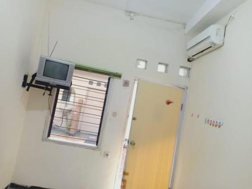 Kamar dengan Ranjang Single
