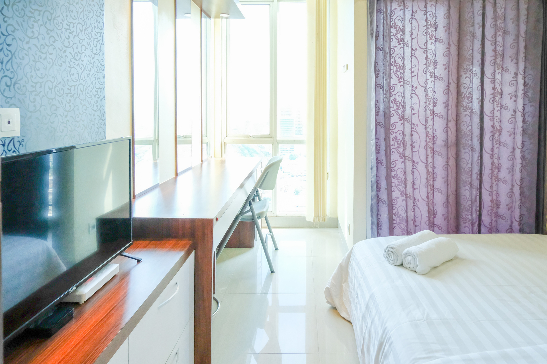 Bedroom 2, Tidy and Compact Studio at Tamansari Papilio Apartment By Travelio, Surabaya