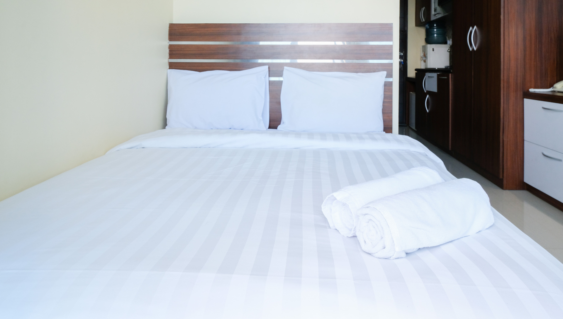 Bedroom 3, Tidy and Compact Studio at Tamansari Papilio Apartment By Travelio, Surabaya