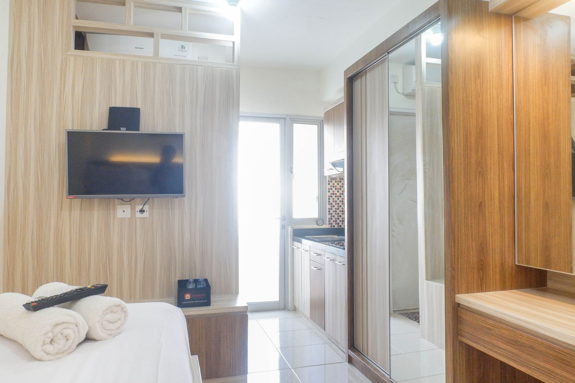 Bedroom 2, Relaxing and Comfortable Studio Apartment at Educity By Travelio, Surabaya