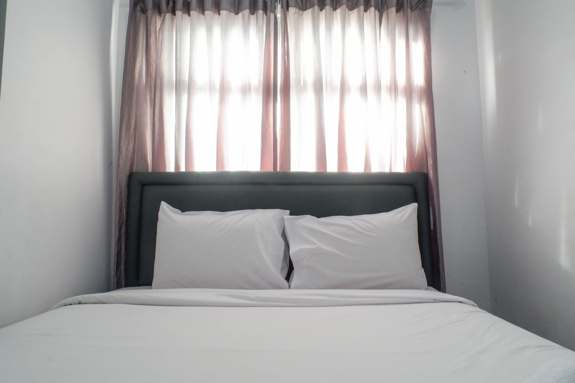 Bedroom 3, Best Deal & Strategic 2BR Apartment at Gunawangsa Merr By Travelio, Surabaya