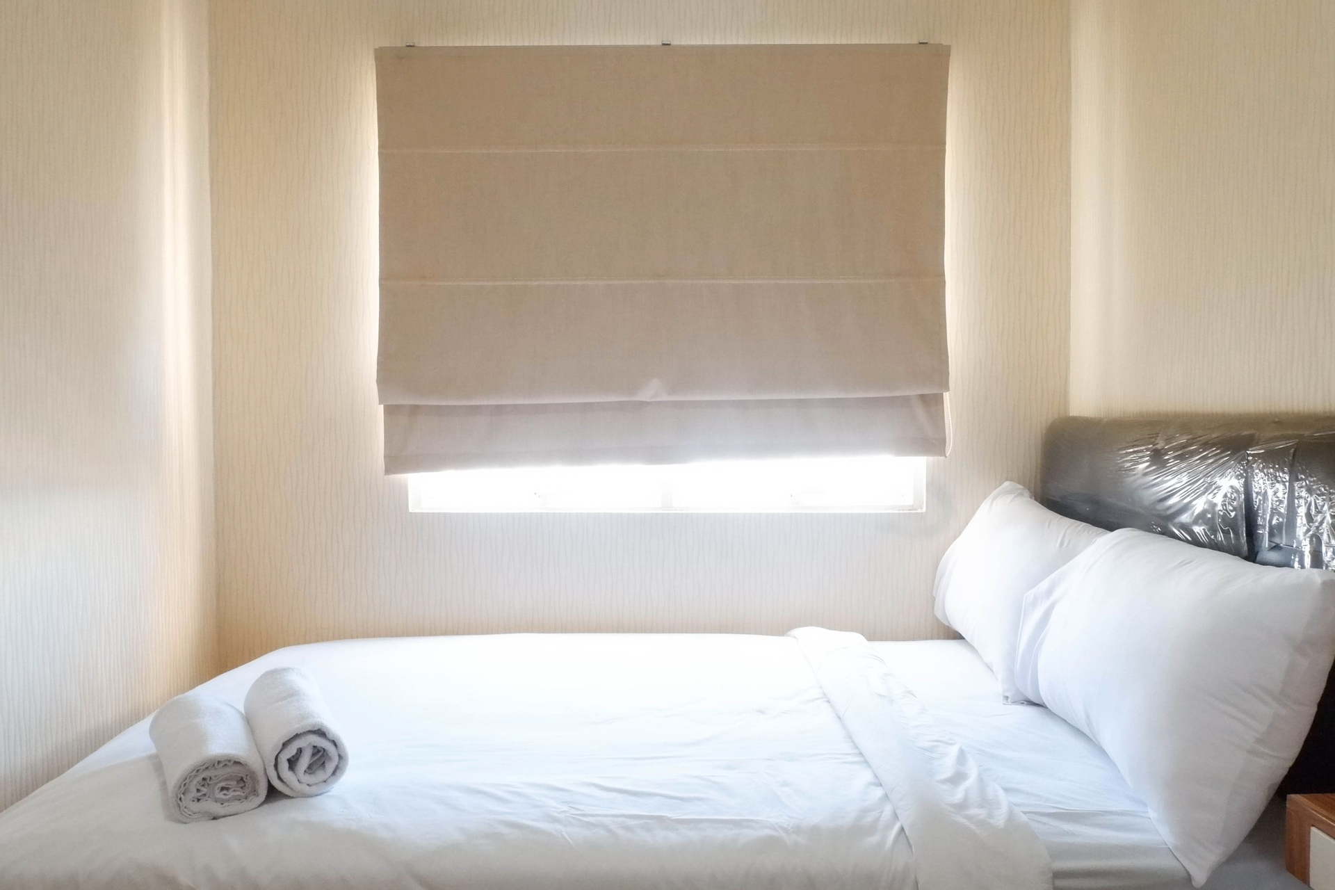 Bedroom 2, Spacious 2BR with Exquisite View at Puncak Dharmahusada Apartment By Travelio, Surabaya