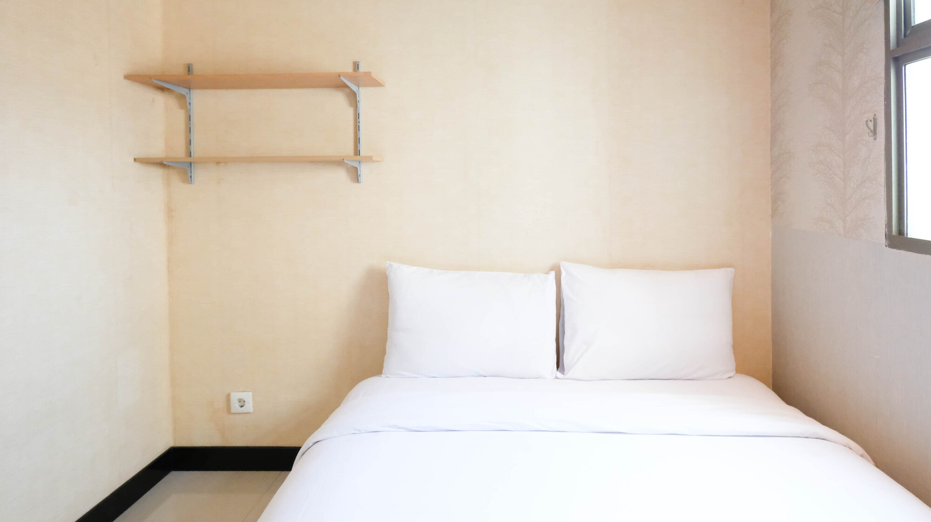 Bedroom 3, Extra Spacious and Homey 2BR at Kondominium Puncak Marina Apartment By Travelio, Surabaya