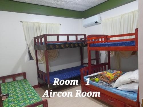 Sales-Marzan Pension House Rental, Aringay