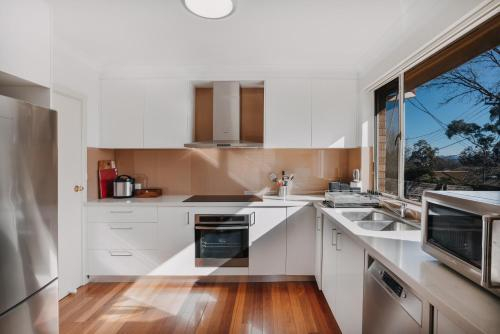 5, Restful Canberra Retreat in Spacious Terrace Home, Deakin