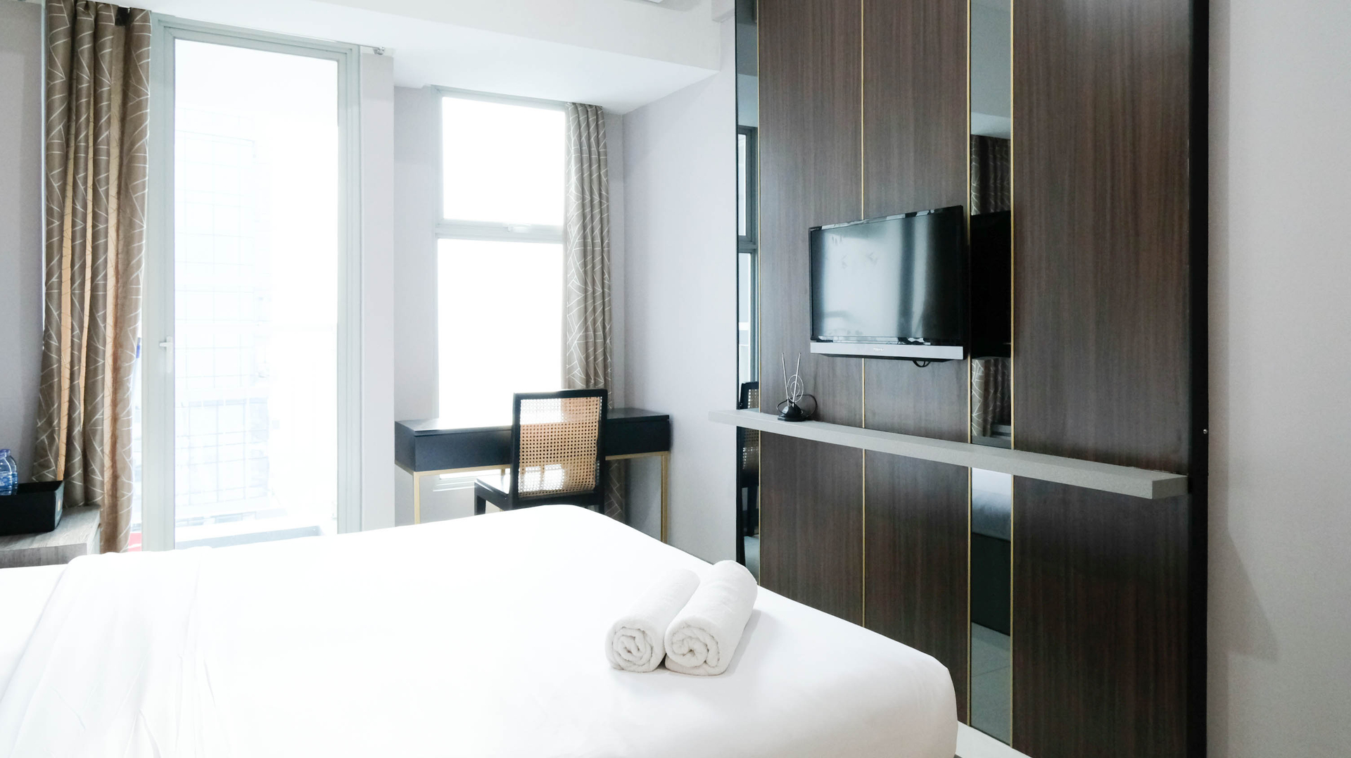 Bedroom 3, Elegant Studio Connected to Mall at Supermall Mansion Apartment By Travelio, Surabaya