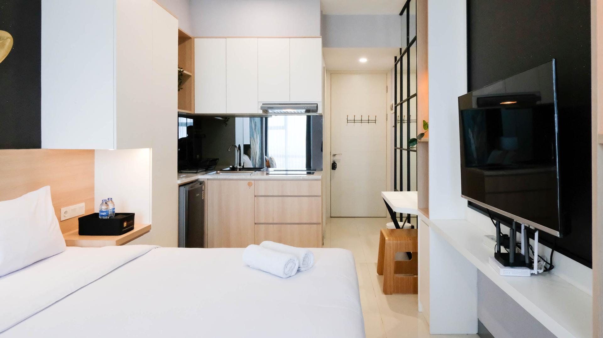 Bedroom 1, Homey and Tidy Studio at Supermall Mansion Apartment By Travelio, Surabaya