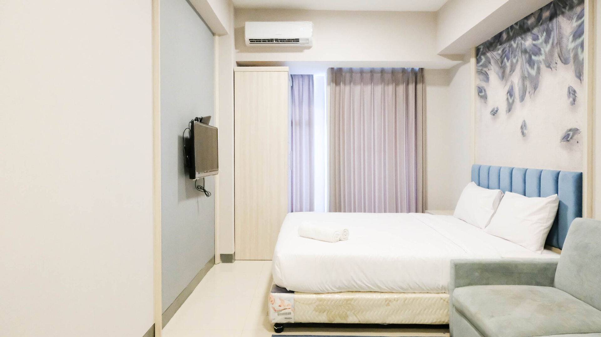 Bedroom 3, Wonderful and Comfy Studio (No Kitchen) at Supermall Mansion Apartment By Travelio, Surabaya