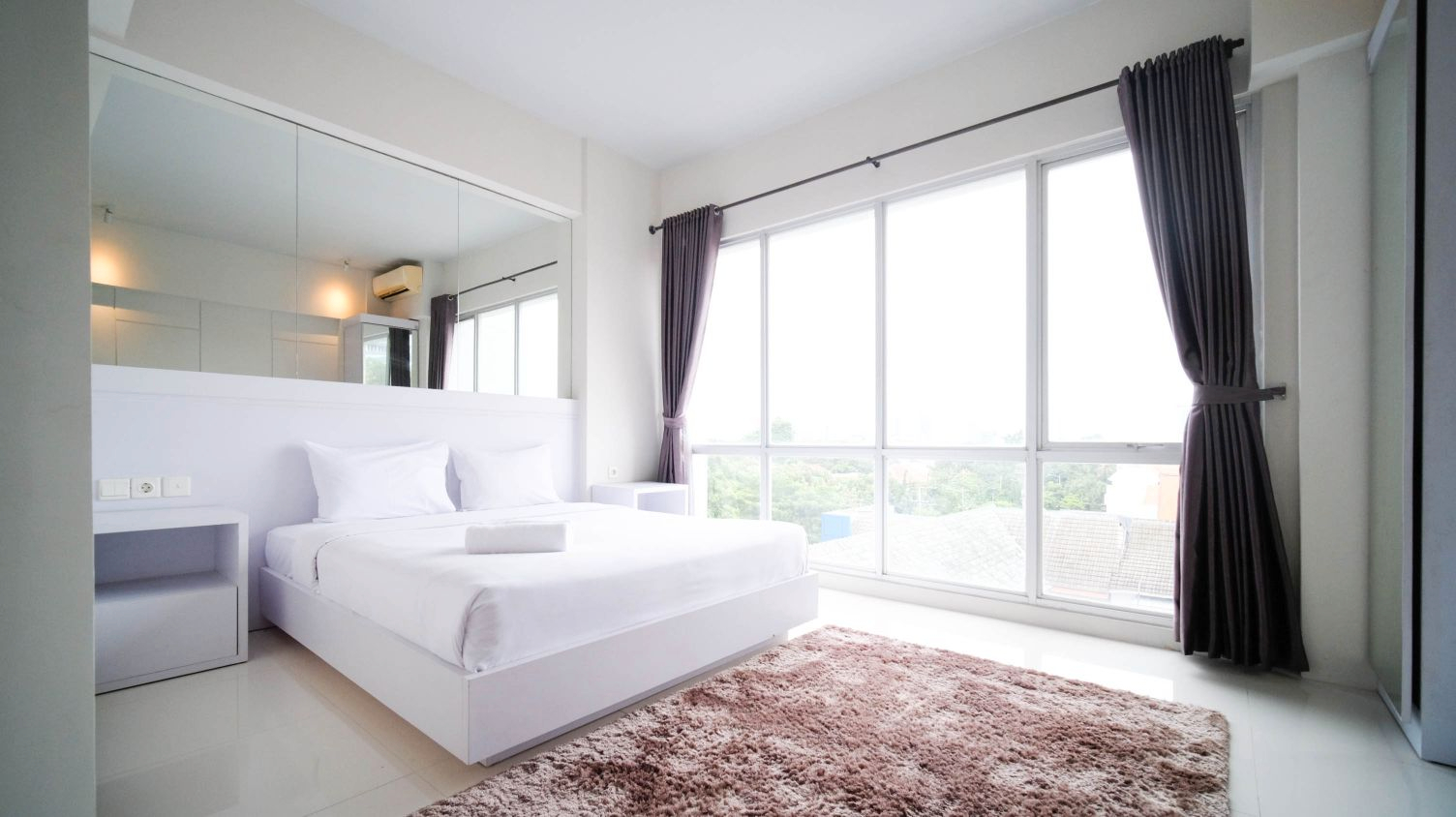 Strategic and Comfy Studio (No Kitchen) at Grand Darmo Suite Apartment By Travelio, Surabaya