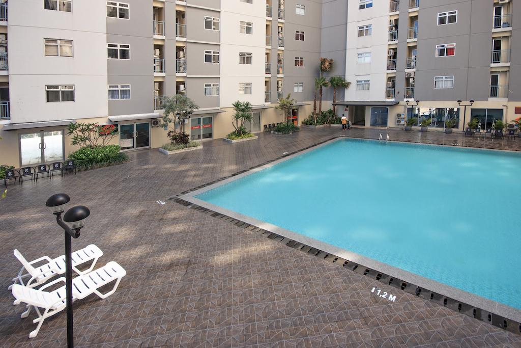 2BR Spacious and Comfortable Apartment at Gunawangsa Manyar By Travelio, Surabaya