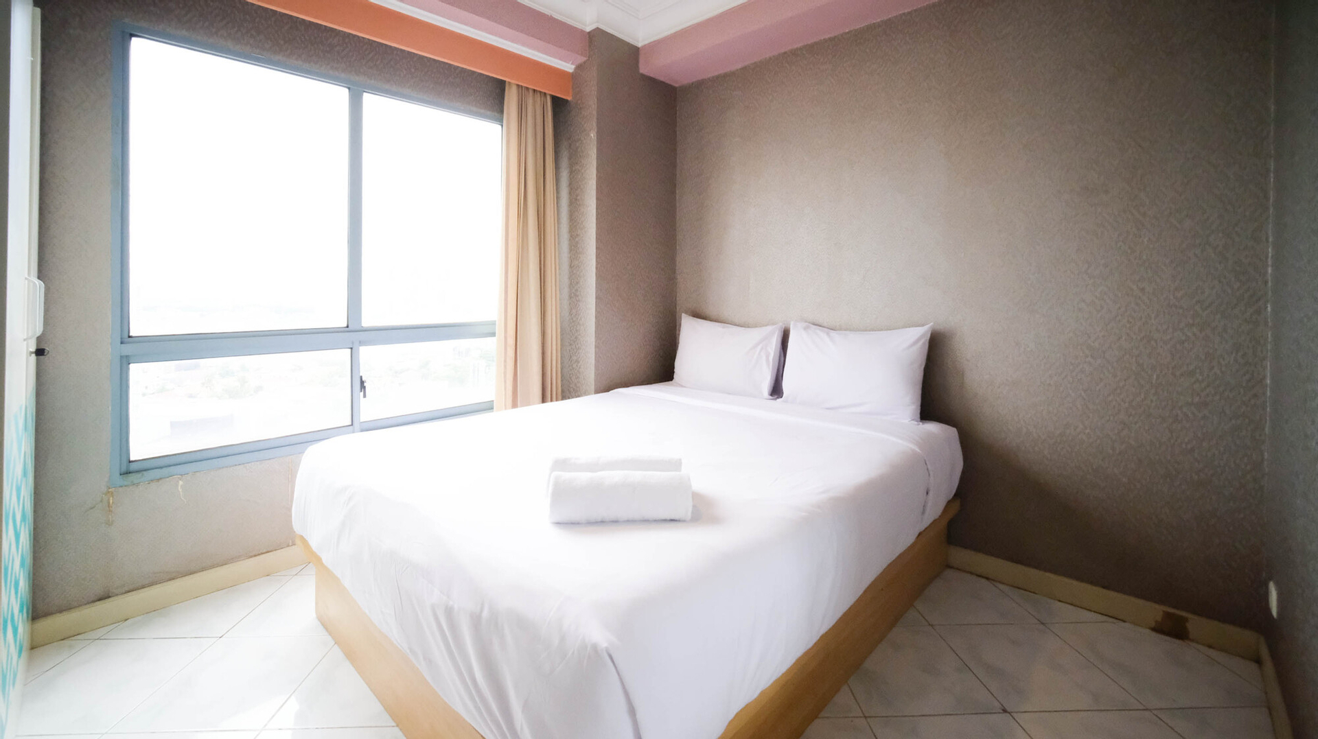 Best Deal and Homey 2BR at Taman Beverly Apartment By Travelio, Surabaya