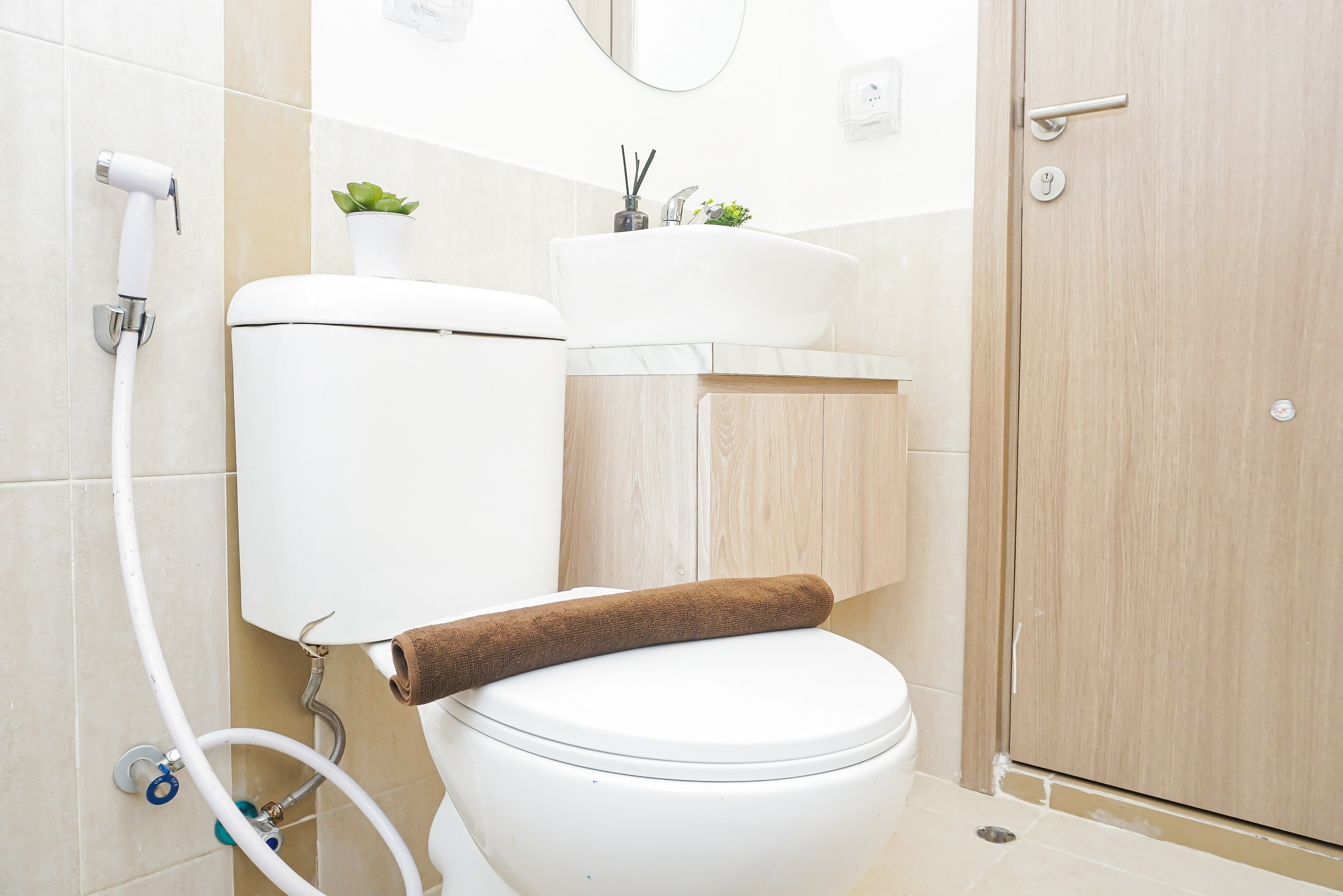 Bathroom 5, Bright Nice 2BR at Apartment Meikarta District 1 By Travelio, Cikarang