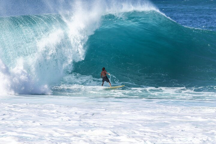 Learn to surf with a local big wave rider on the North Shore of