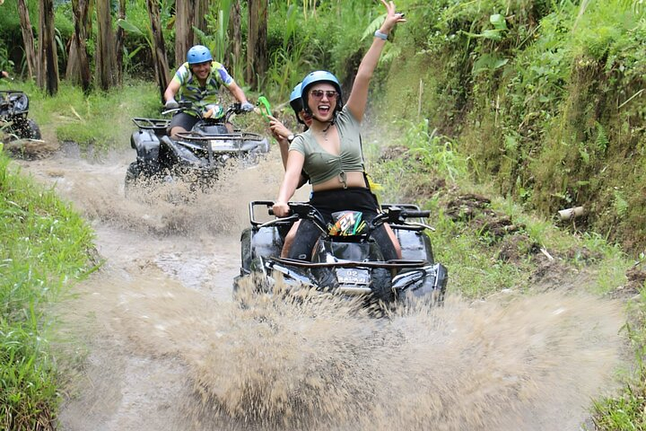 Ubud outdoor adventure activities featuring ATV quad biking and Ayung River rafting