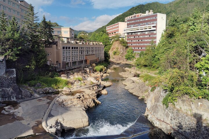 Get Ticket Sapporo: Jozankei Onsen Walk with Temple & Cave Visit
