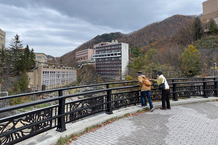 Get Ticket Sapporo: Jozankei Onsen Walk with Temple & Cave Visit