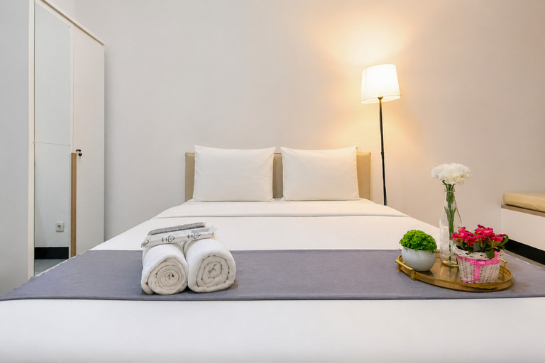 Bedroom 2, Bright and Cozy Studio at Apartment Westown View Surabaya By Travelio, Surabaya