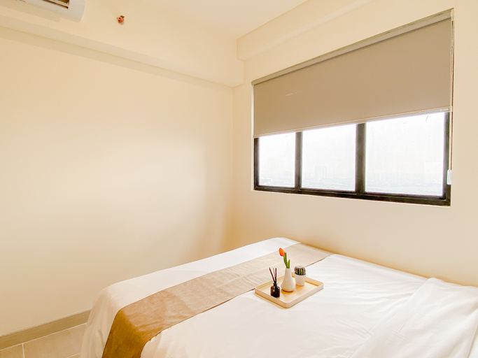 Bedroom 5, Homey and Serene 2BR at Apartment Meikarta District 2 By Travelio, Cikarang