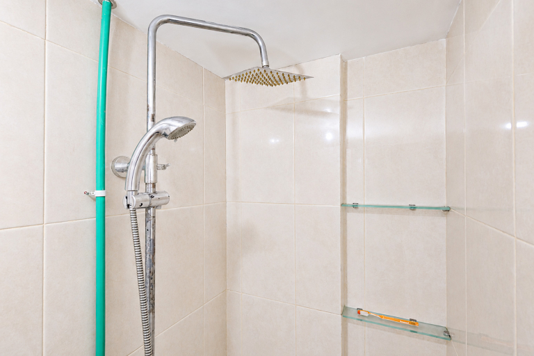 Bathroom 5, Compact with Minimalist Design 2BR at Springlake Summarecon Bekasi Apartment By Travelio, Bekasi