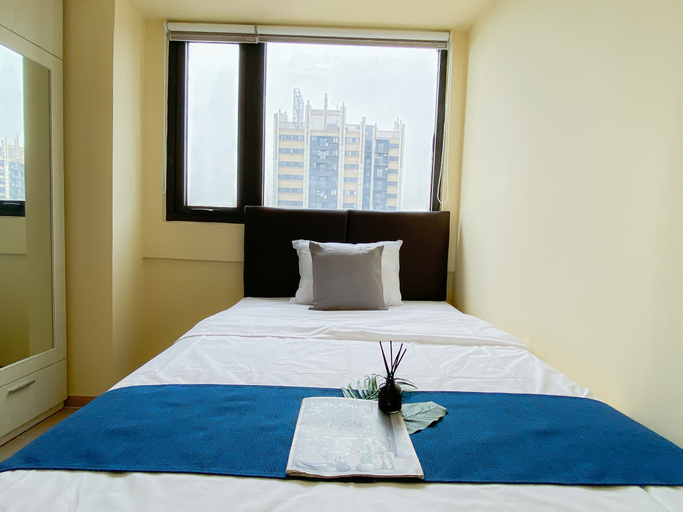 Bedroom 3, Cozy and Trendy 3BR at Meikarta District 1 Apartment By Travelio, Cikarang