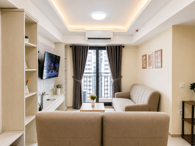 Living Room 2, Cozy and Trendy 3BR at Meikarta District 1 Apartment By Travelio, Cikarang