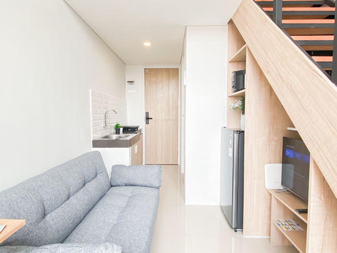 Living Room 5, Practical Studio Loft at Apartment Apple 3 Condovilla by Travelio, South Jakarta