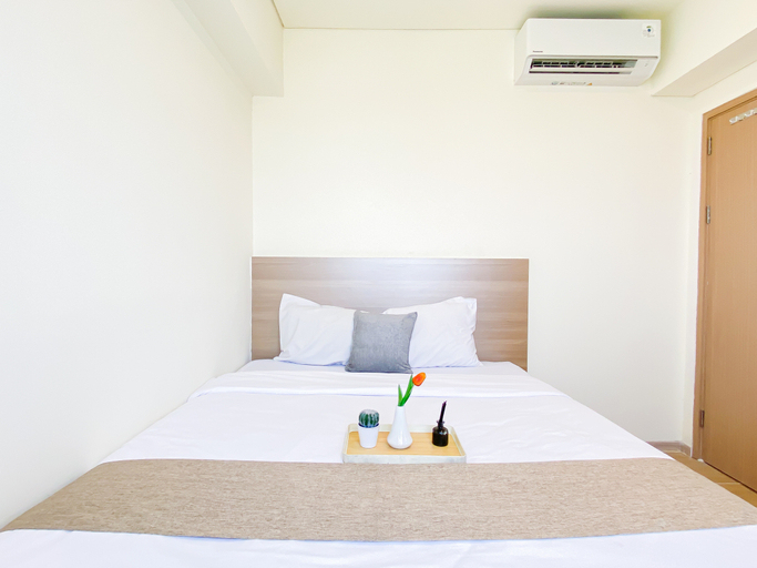 Bedroom 5, Bright and Homey 2BR Apartment Meikarta District 2 By Travelio, Cikarang