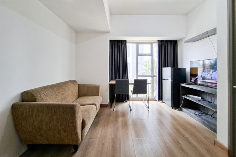 Living Room 5, Warm 1BR with Pool View at Apartment M-Town Residence By Travelio, Tangerang