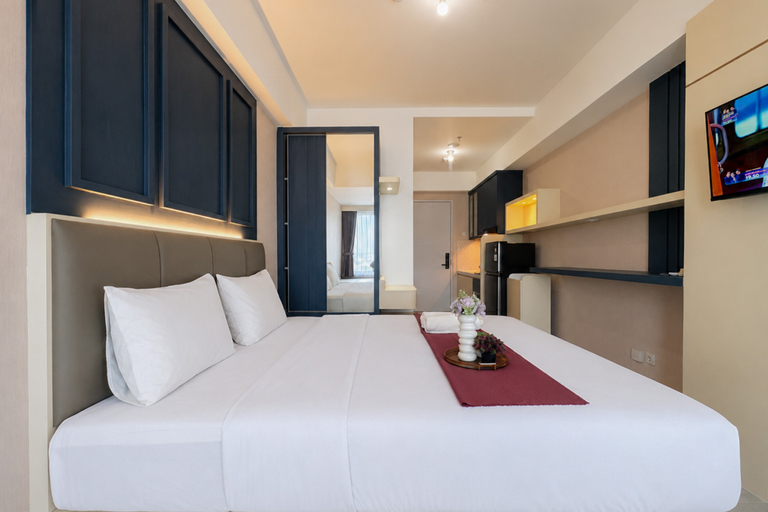 Bedroom 2, Stylish and Warm Studio at Apartment Westown View Surabaya By Travelio, Surabaya